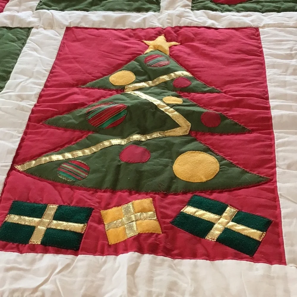 Handmade Christmas-themed applique quilt